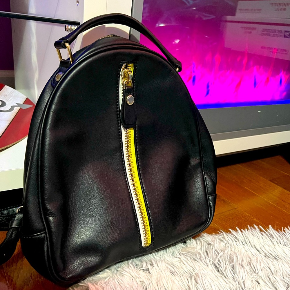 EUC Steve Madden vegan leather backpack beautiful black half white yellow zipper